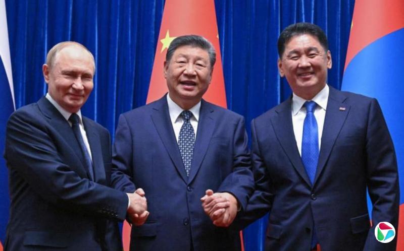 习近平:国际形势越是变乱交织 中俄蒙越要加强团结协作