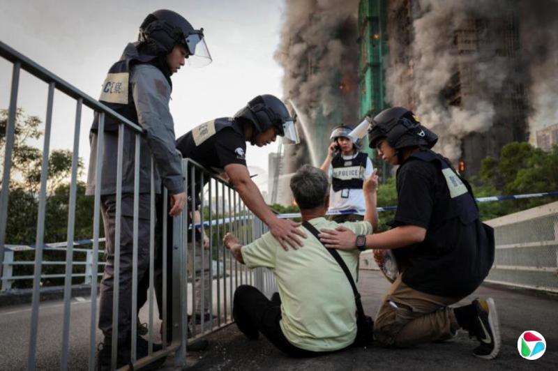 香港七旬老人悲痛瞬间成火灾标志画面 其妻仍下落不明