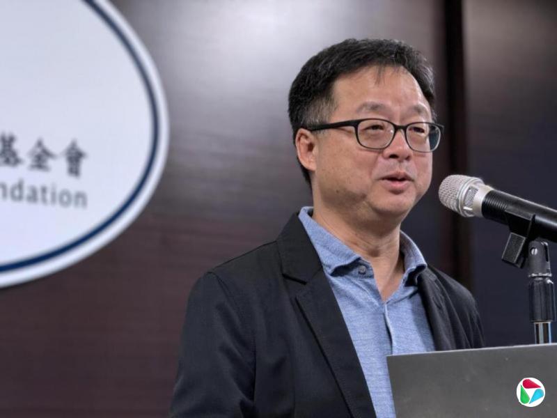 台海基会秘书长:两岸问题不在民族在民主