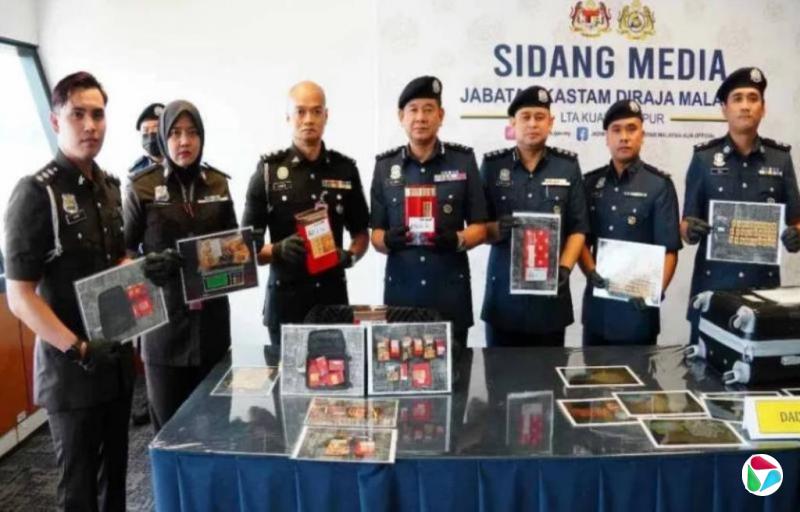 茶叶盒玩偶藏毒近15公斤 两外籍男女在吉隆坡机场被捕