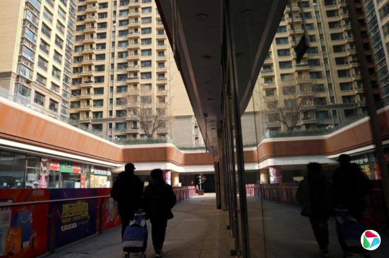 IMF���й�ͨ�ͳ��ֻ������� ����¥��֧�����踴��